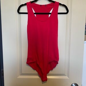 hot pink body suit